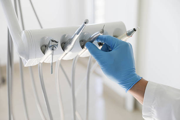 Professional Tooth Extraction technician working in Portland, IN